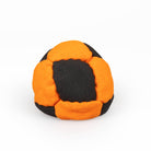 Orange and black hacky sack straight on