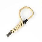 Gora fire whip with whip wound round the handle