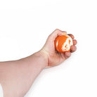 Oddballs bounce juggling ball orange in hand