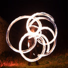 performer with fire poi